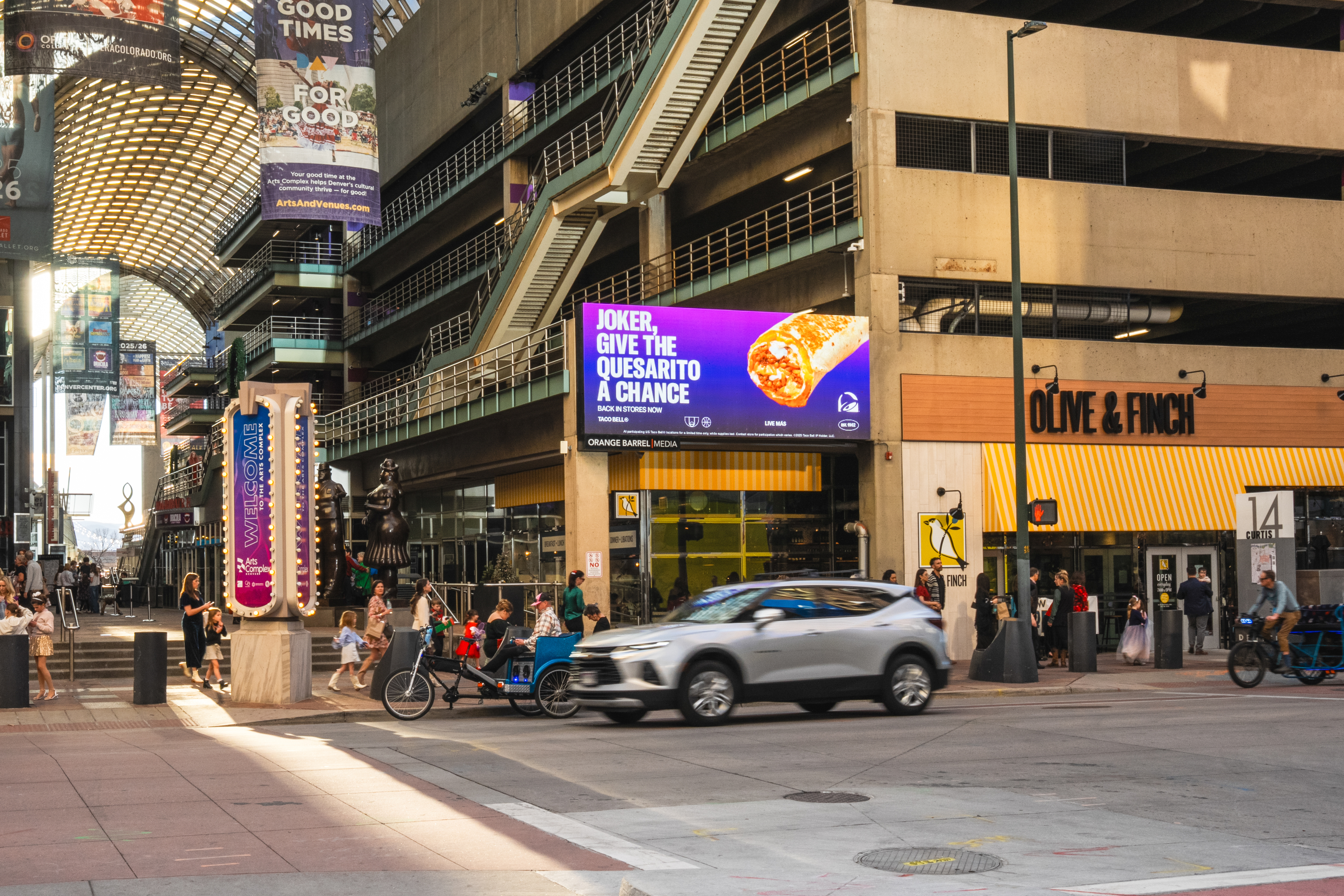 Bilboard saying "Joker Give the Quesarito a chance!" 